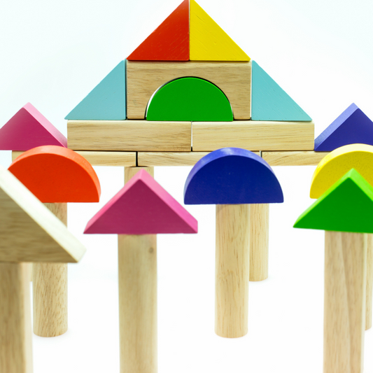 a group of wooden blocks with different colors