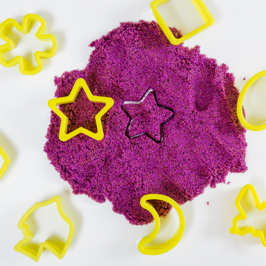 a purple sand with yellow molds on it