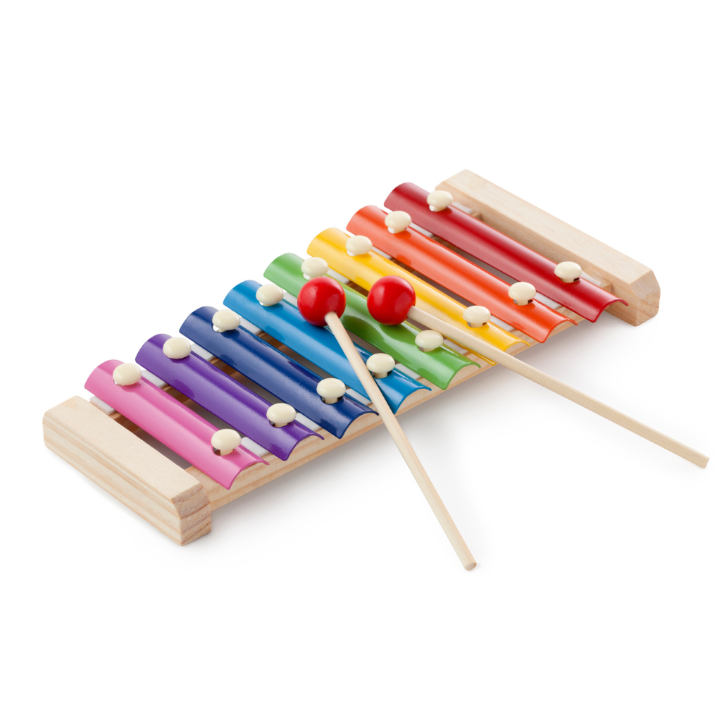 a colorful xylophone with sticks