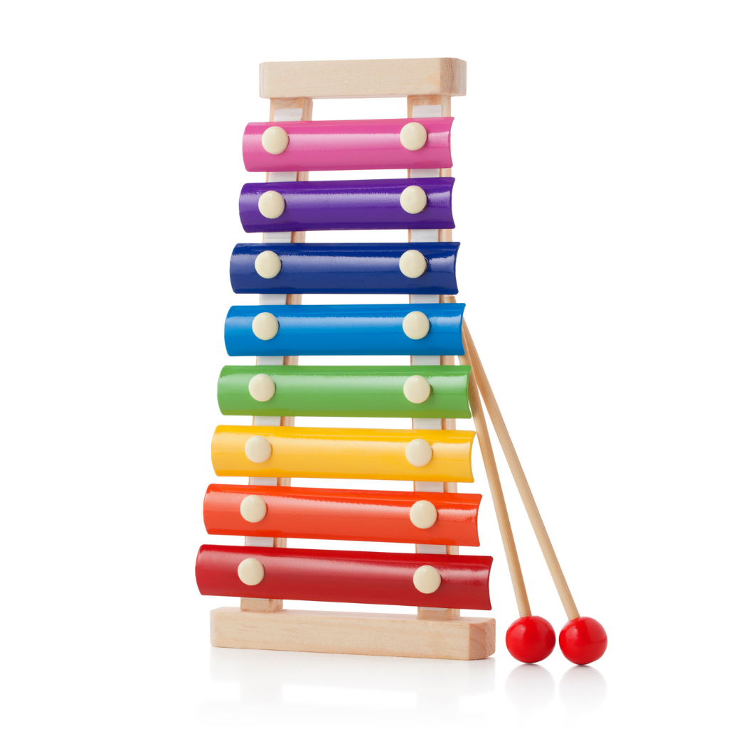 a colorful xylophone with two sticks